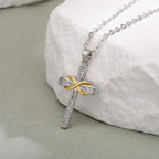 Collier avec pendentif croix et symbole infini bicolore