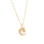 Ketting met hanger "hemelse eclips" halve maan en strass
