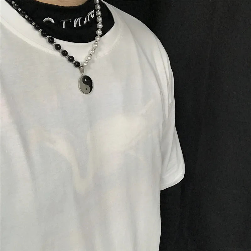 Collier avec Pendentif en Perles Yin Yang Noir et Blanc