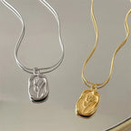 Collier avec pendentif fleur de rose