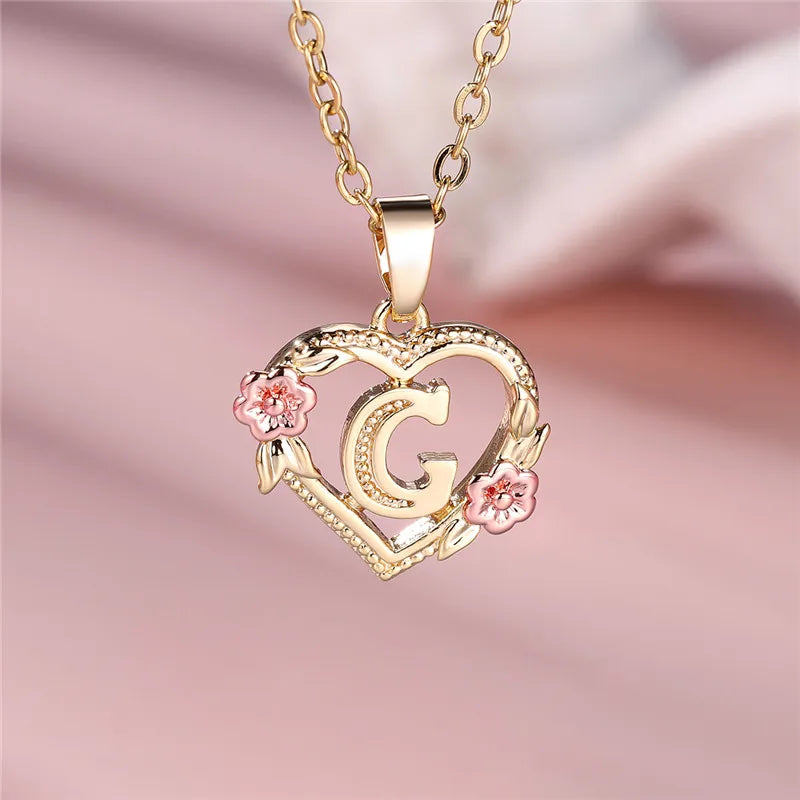 Necklace with heart and flowers initial pendant g