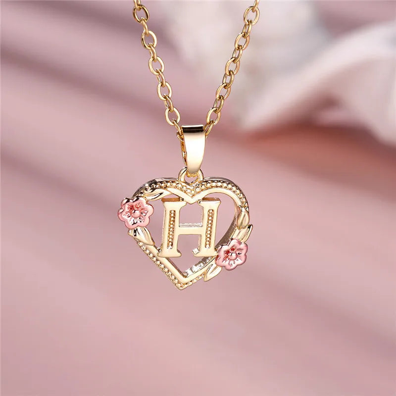 Necklace with heart and flowers initial pendant h