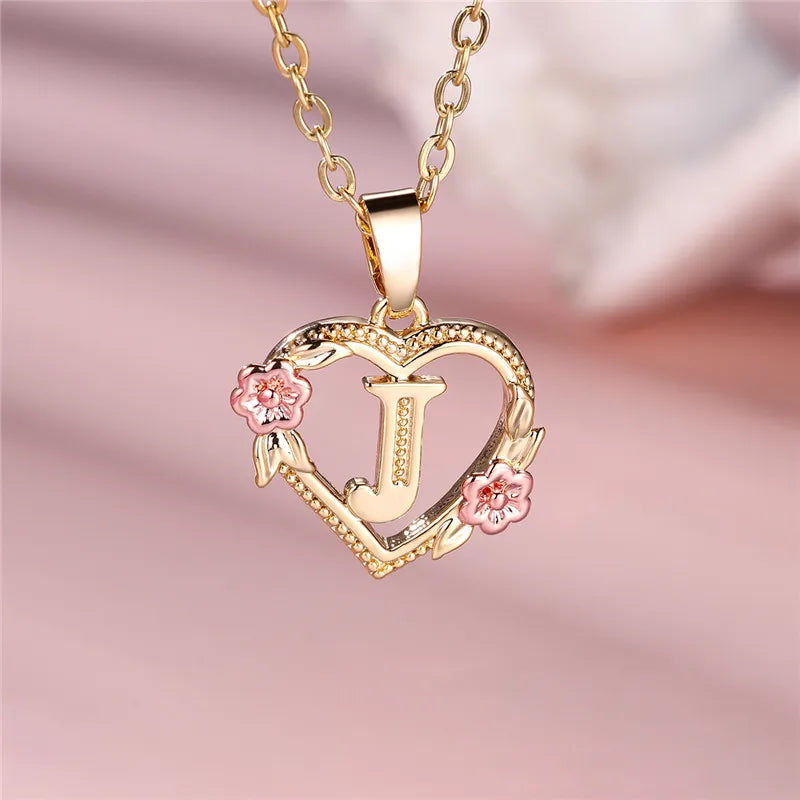 Necklace with heart and flowers initial pendant j