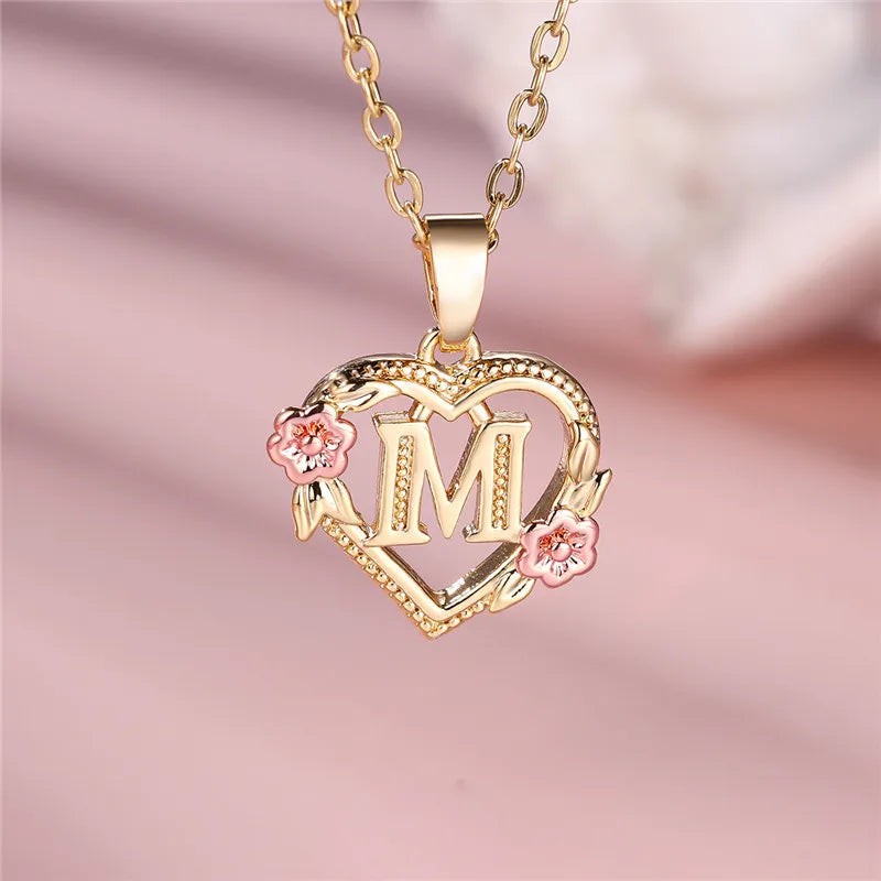 Necklace with heart and flowers initial pendant m