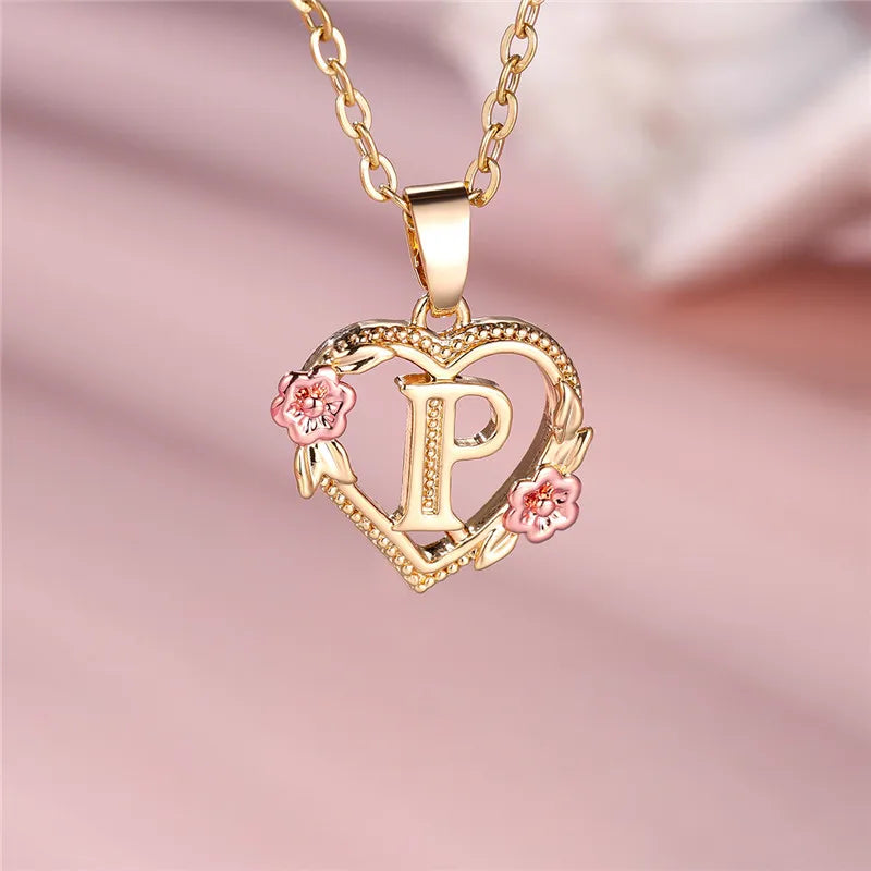 Necklace with heart and flowers initial pendant p