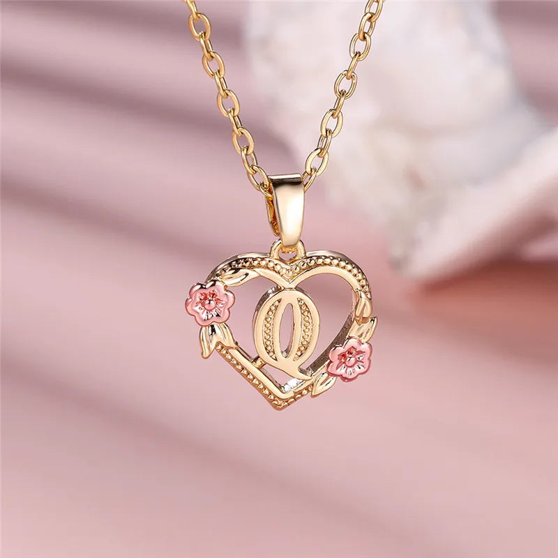Necklace with heart and flowers initial pendant q