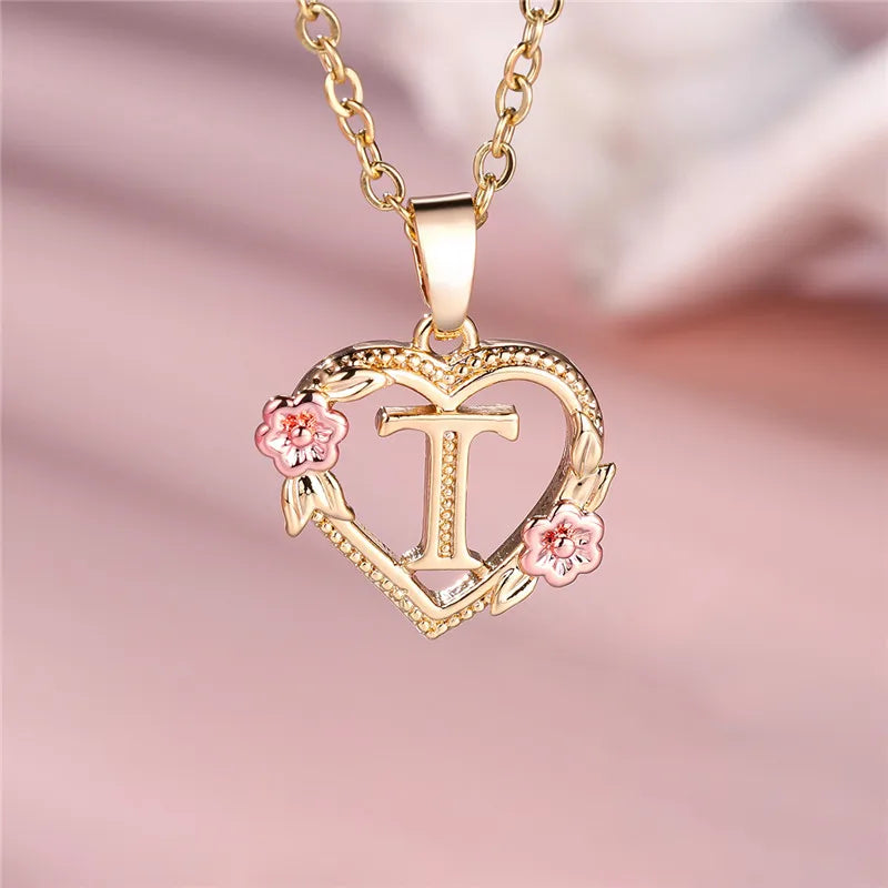 Necklace with heart and flowers initial pendant t