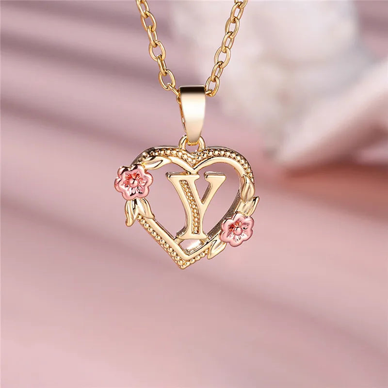 Necklace with heart and flowers initial pendant y