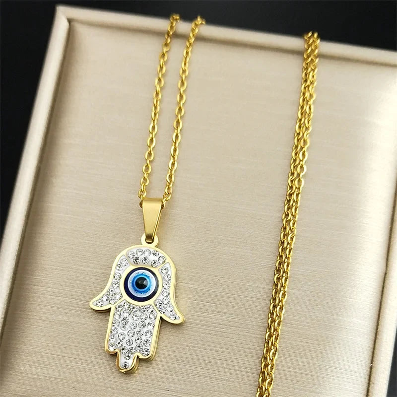 Long necklace with pendant for protection against the evil <span data-glossary-id="oeil">eye</span> and Arabic Fatma's hand gold