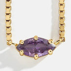 Collier avec pendentif pierre de naissance en forme d'oeil février