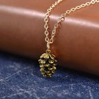 Collier avec Pendentif Pomme de Pin Femme or