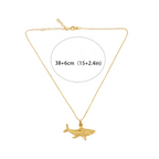 Collier avec pendentif requin doré