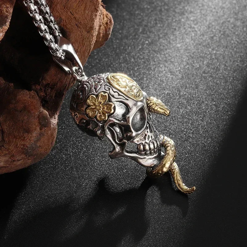 Necklace with symbolic skull and snake pendant