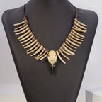 Collier avec pendentif tête de mort "Odin" et squelette en résine effet os