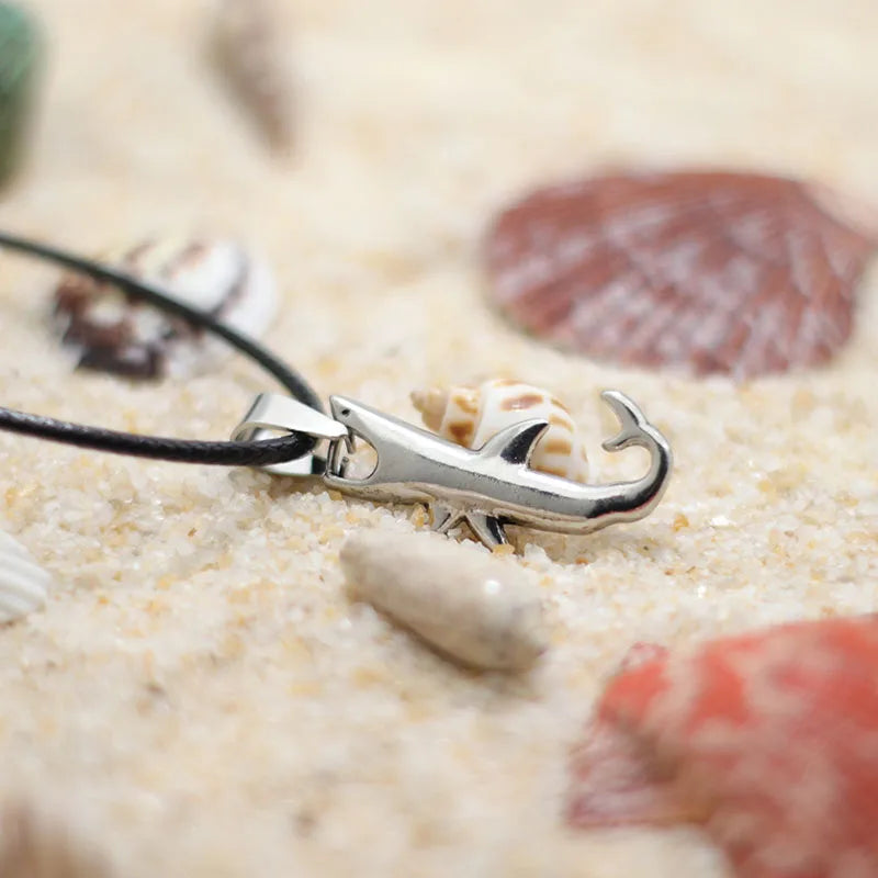 Cord necklace with silver shark pendant