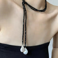 Collier de Charme avec Pendentif perles noir