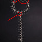 Rückenkette mit Skelett- und Totenkopf-Anhänger