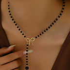Collier de Perles avec Pendentif Noeud noir