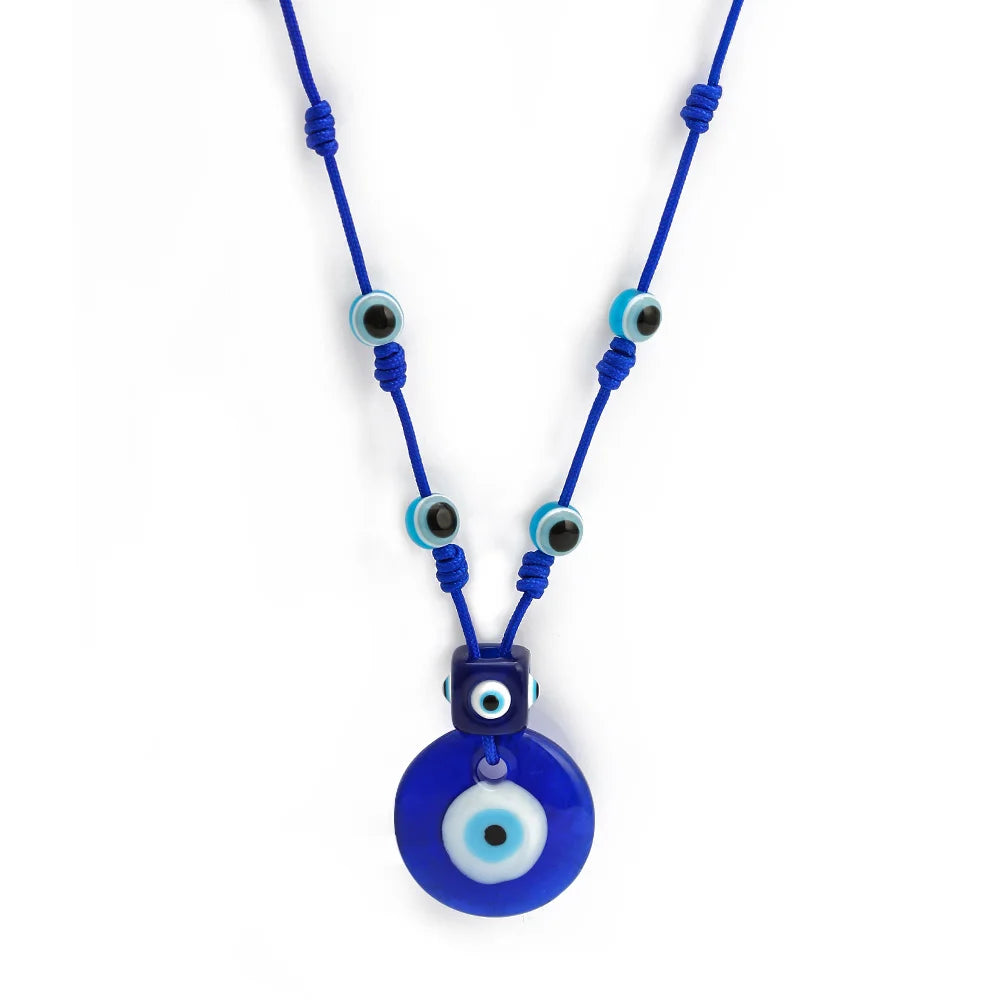 Collier en corde avec grand pendentif oeil bleu