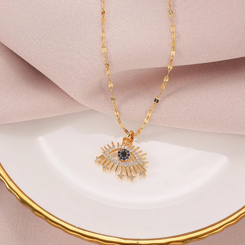 Collier de protection avec pendentif oeil bleu rayonnant