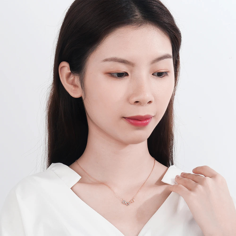 Collier Double Pendentif Infini et Zircon or rose