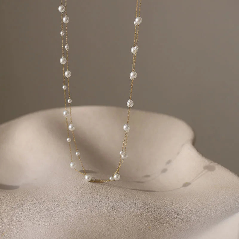 Collana a doppio giro con ciondolo a perla