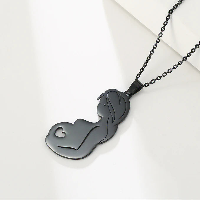 Collier et son pendentif "femme enceinte"