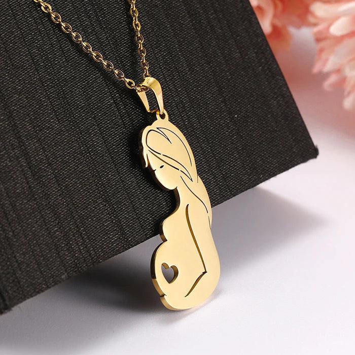 Collier et son pendentif "femme enceinte"