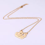 Collier et son pendentif "Maman, papa, et bébé"