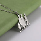 Collier et son pendentif "Maman, papa, fils et fille"