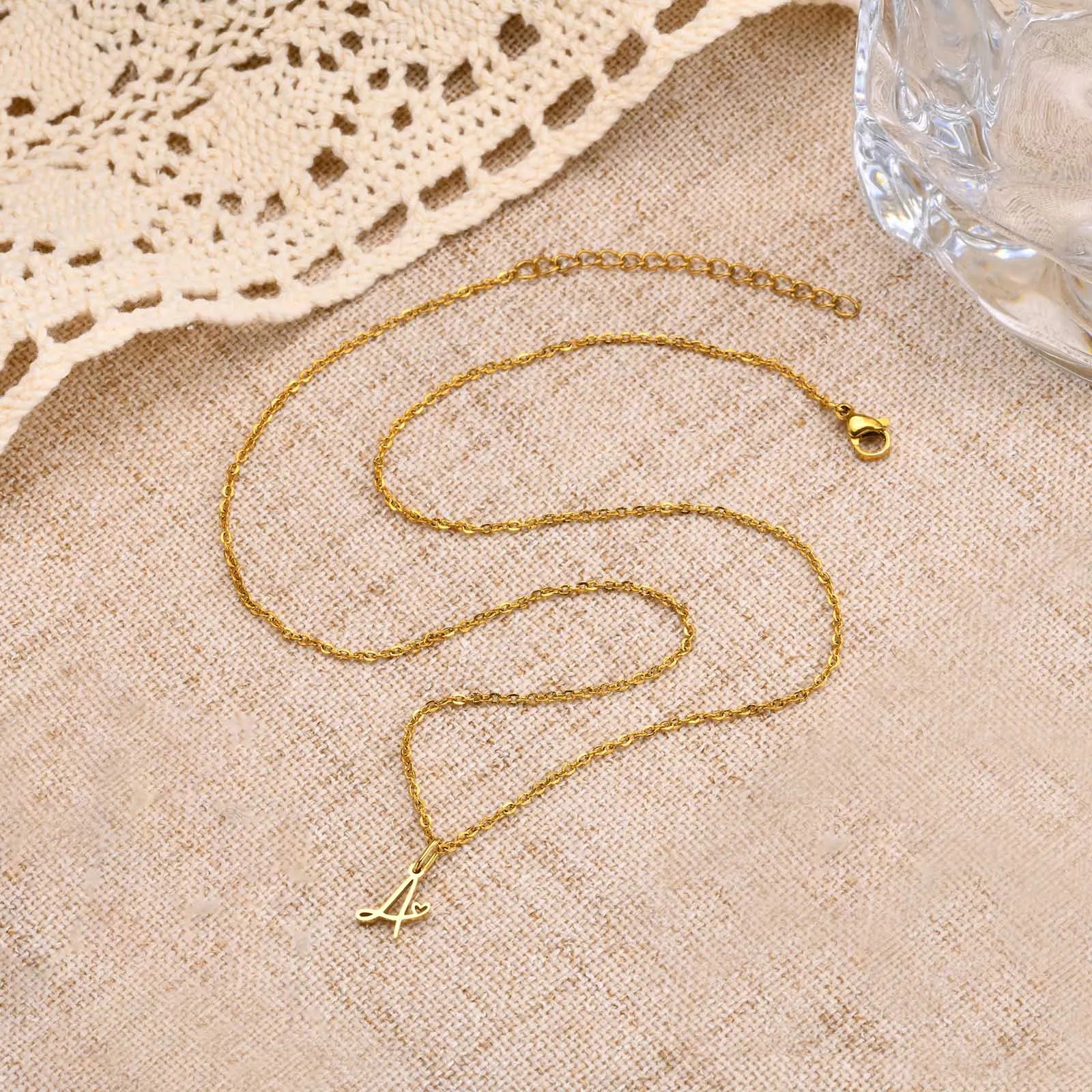 Women's necklace with initial letter and heart pendant