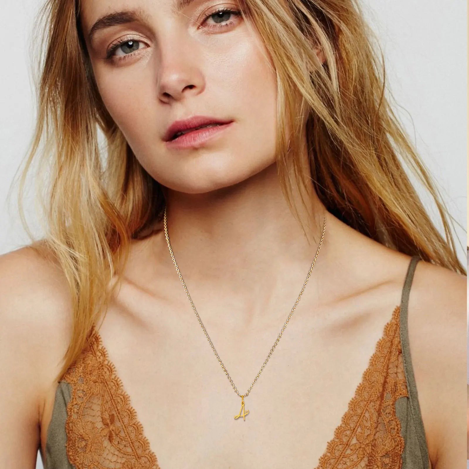 Women's necklace with initial letter and heart pendant