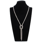 Lange ketting met knoop-hanger in zilver