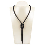 Lange ketting met knoop-hanger in zwart