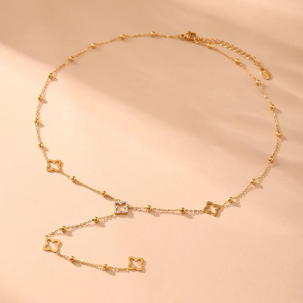 Collier Long avec Pendentifs Trèfle à 4 Feuilles et Zircon or