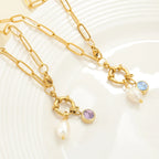 Link chain necklace with pearl pendant and February birthstone