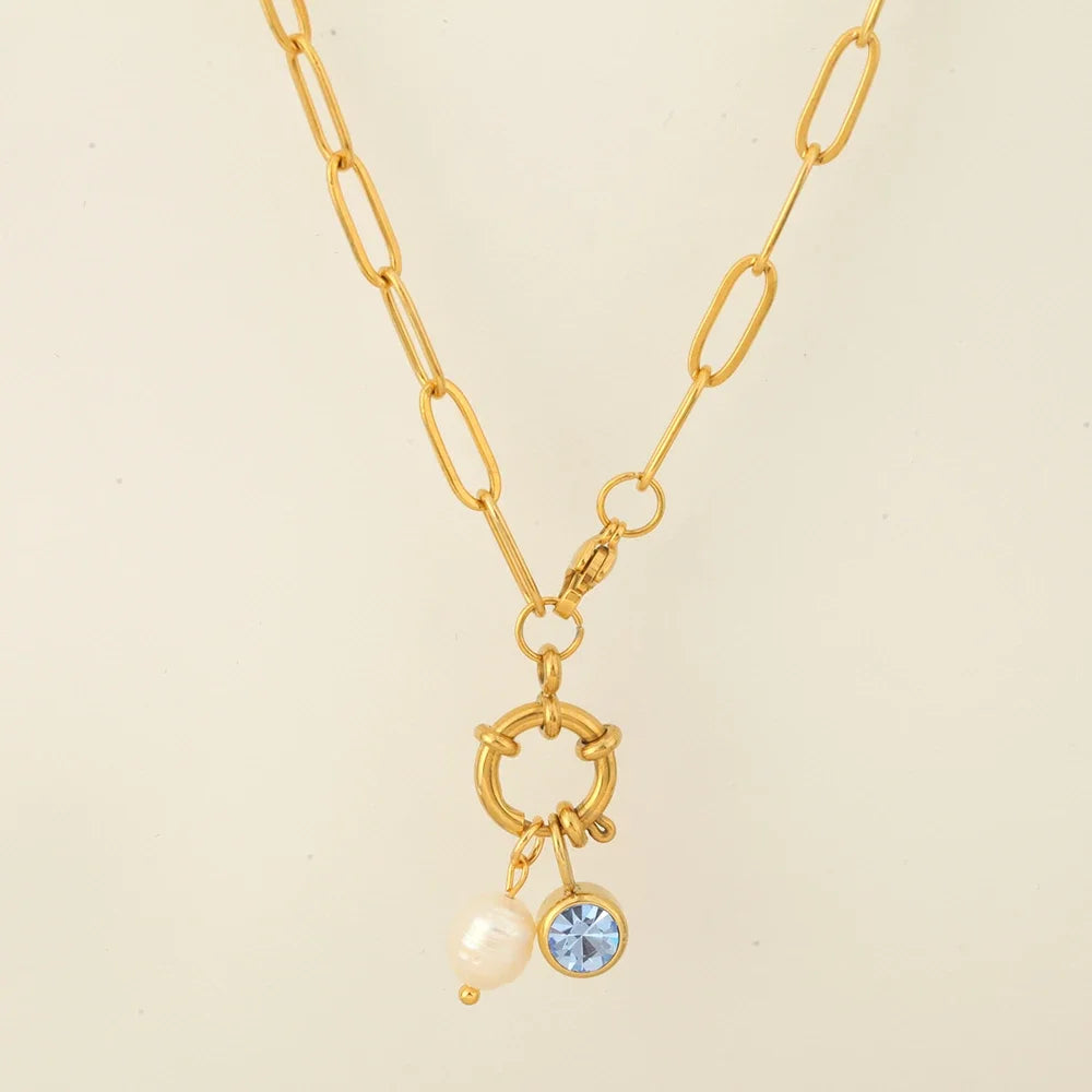 Link chain necklace with pearl pendant and April birthstone