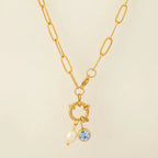 Link chain necklace with pearl pendant and April birthstone