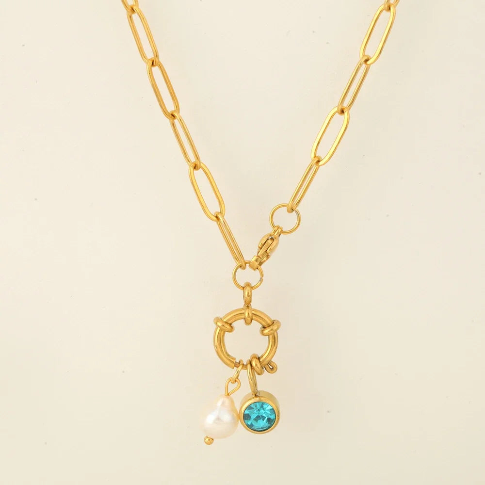 Link chain necklace with pearl pendant and December birthstone