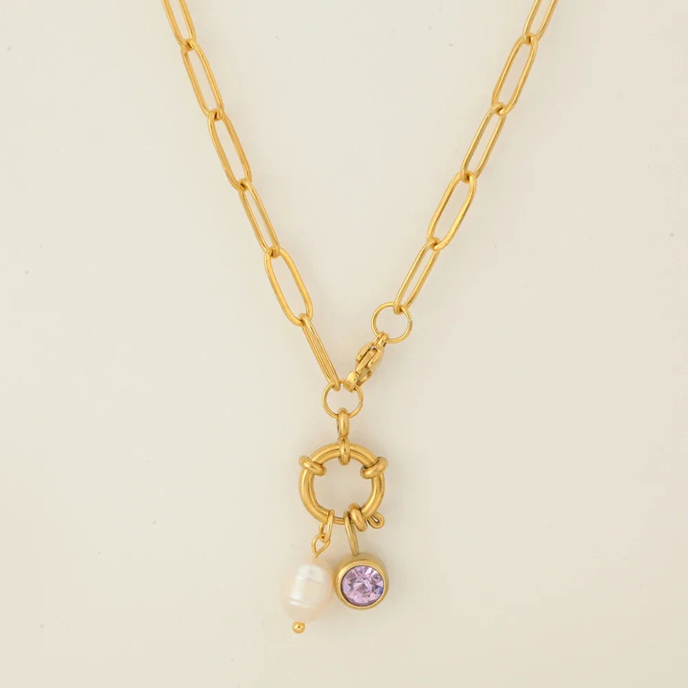 Link chain necklace with pearl pendant and February birthstone