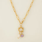 Link chain necklace with pearl pendant and February birthstone