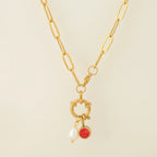 Link chain necklace with pearl pendant and January birthstone