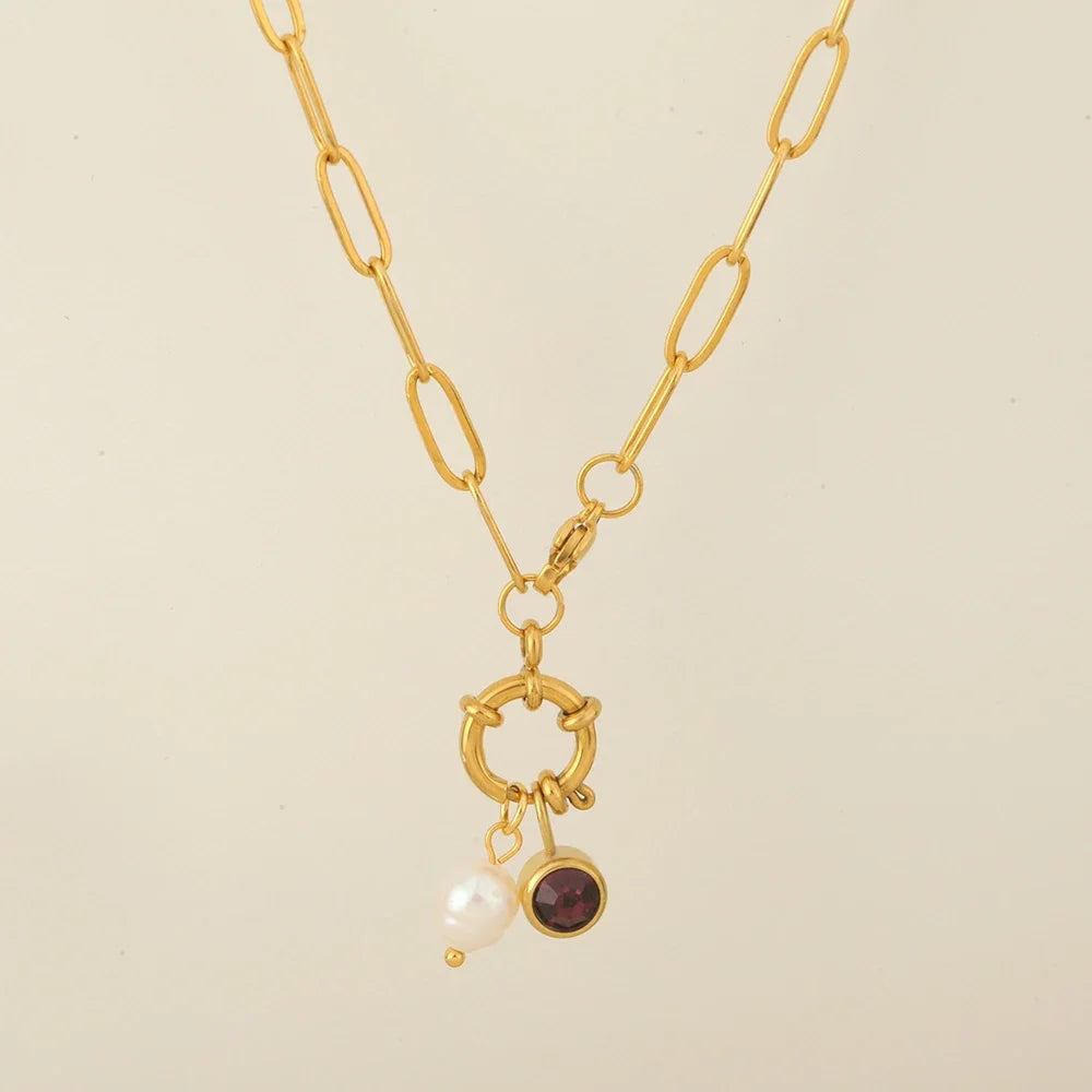 Link chain necklace with pearl pendant and May birthstone