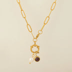 Link chain necklace with pearl pendant and May birthstone