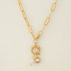 Link chain necklace with pearl pendant and March birthstone