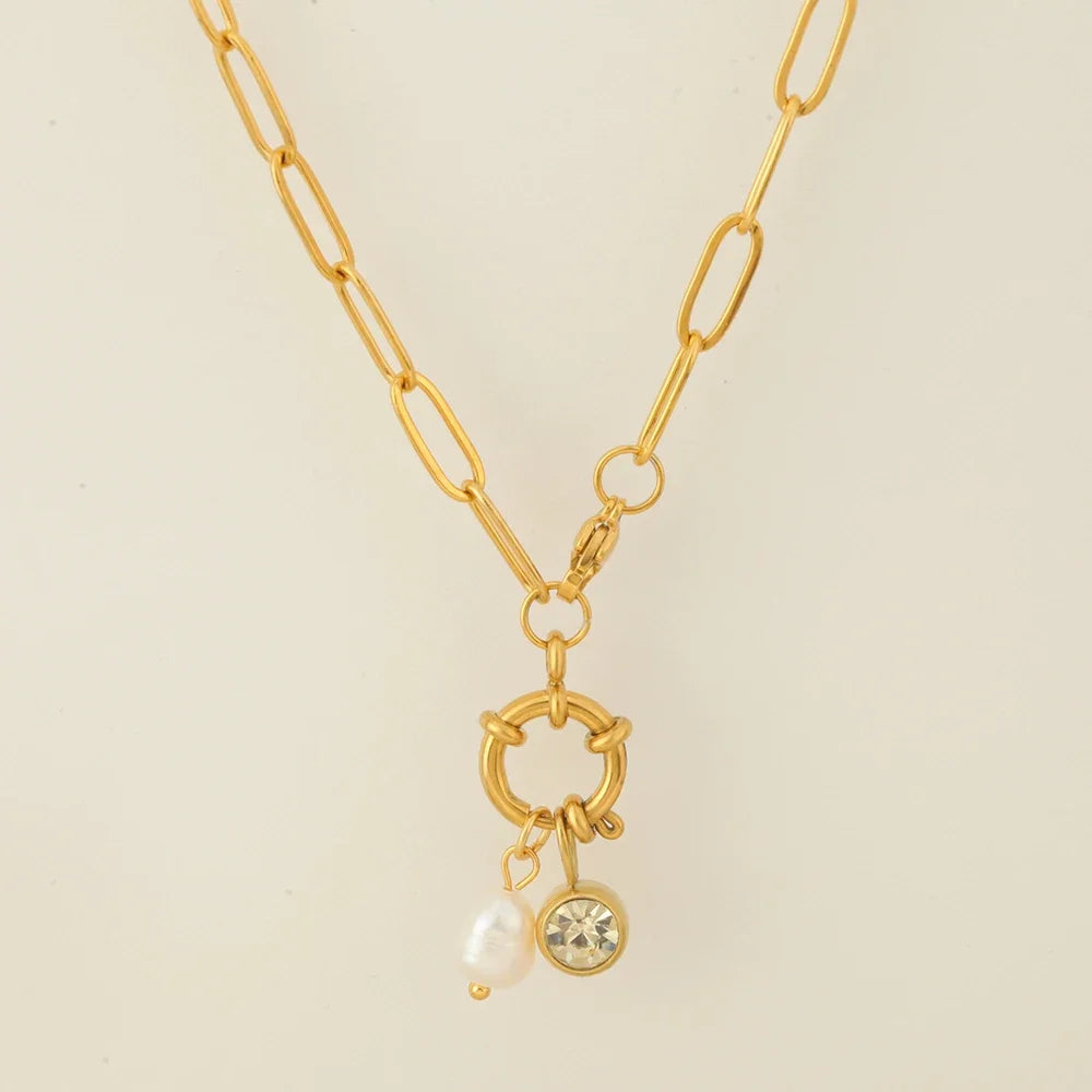 Link chain necklace with pearl pendant and November birthstone