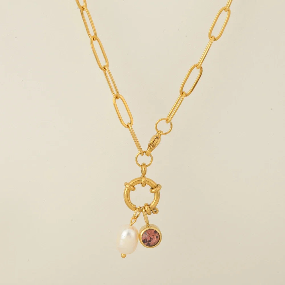 Link chain necklace with pearl pendant and October birthstone