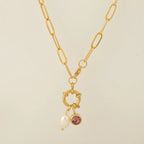 Link chain necklace with pearl pendant and October birthstone