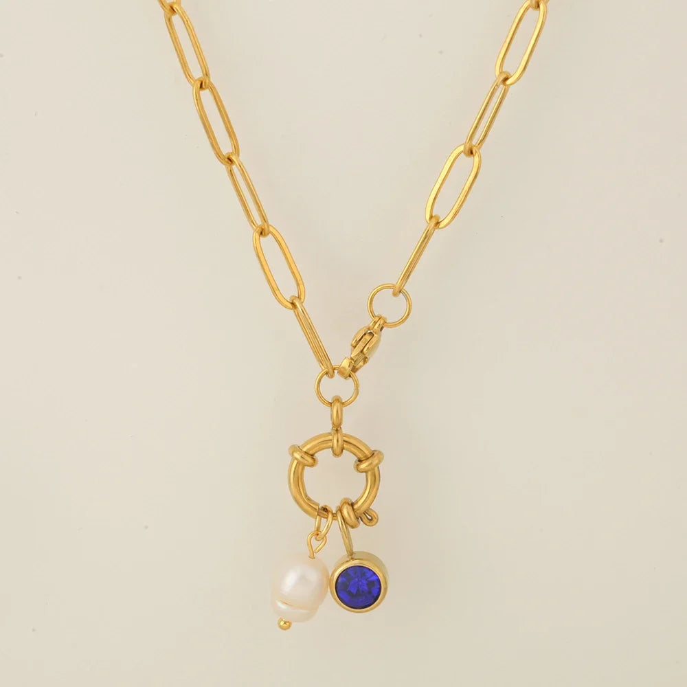Link chain necklace with pearl pendant and September birthstone