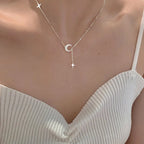 Collana con ciondolo a luna in zirconio e stelle